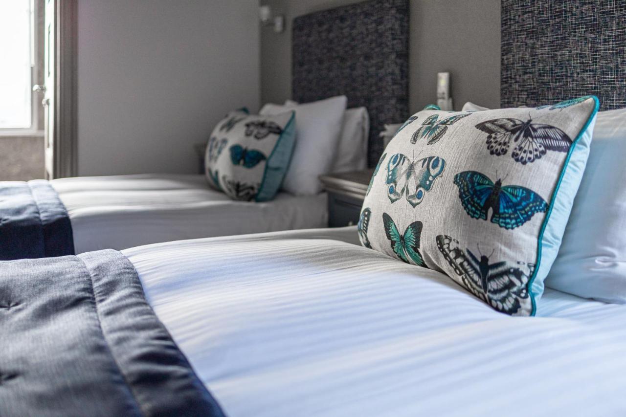 Ennios Boutique Hotel Southampton Exteriör bild A bedroom at the hotel
