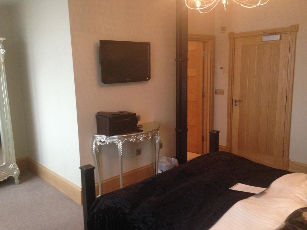 Ennios Boutique Hotel Southampton Rum bild A bedroom at the hotel